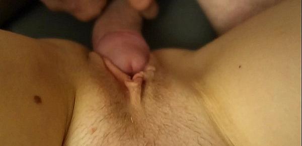  Young Sinna watching porn at home having three orgasms then footjob teasing hard cock and almost putting thick cock inside bare pussy when edging it to the limit, condom sex and huge cumload all over